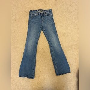 American Eagle dark blue denim flare jeans.